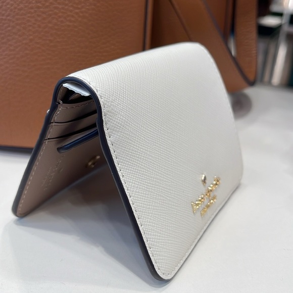Kate Spade Madison Small Bifold Wallet
Meringue 
NWT - Picture 8 of 16